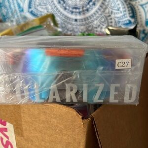 Orange and blue pit vipers